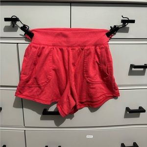 Red athletic shorts. 4-6